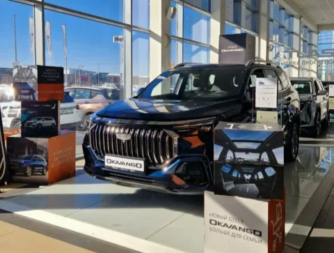 Оками Geely